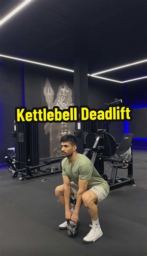 How to do KETTLEBELL DEADLIFT BODY PART Quadriceps,Hamstrings,Groin,Glutes EQUIPMENT Kettlebell DIFFICULTY Beginner DESCRIPTION 🟢Step 1: Stand in athletic posture with feet hip to shoulder width apart and toes pointing forward. Hinge at the hips and bend the knees to grab onto the kettlebell which is positioned between the midfeet. Brace the abs. Step 2: With the back flat and chin tucked, push into the floor to lift the kettlebell until the body is full 🟢upright. Step 3: Reverse the pattern, 