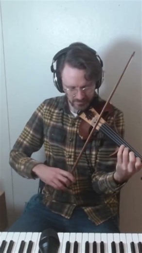 Electric violin solo over heroic original loop