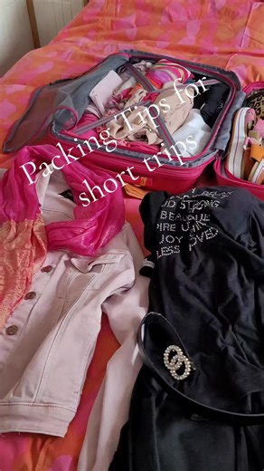 Packing tips for short trips. Colour coordination is the trick. I'm going to Malta in March, and it won't be that warm, around 16 degrees. Here I've chosen black, white and pink as my colours. @visitmalta @aerlingus @ryanair #packingtips #packing #travelhack #whatjoansaw #joansjourneys