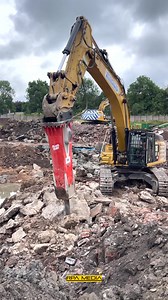 Metropolitan Demolition's CAT 352F with Rammer hammer breaking up slabs and footings | RPA Media