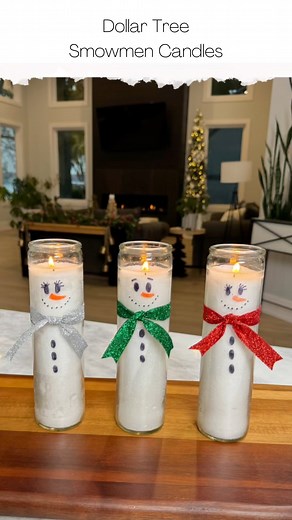 DIY Snowman Candles. Comment LINK and I'll send you a DM with the supplies. DIY snowman candle centerpieces are a delightful addition to any winter or holiday decor. Crafting these charming centerpieces involves taking three white candles from the Dollar Tree as the snowman's body, then adorning them with drawing black "coal" eyes, black "coal" buttons down the center and a orange sharpie "carrot" for the nose, and a ribbon scarf. These whimsical creations not only provide a warm, festive glow b