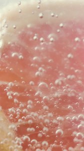 Grapefruit dipped in soda - Free Stock Video