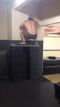 Bodybuilder doing a 70inch vertical jump
