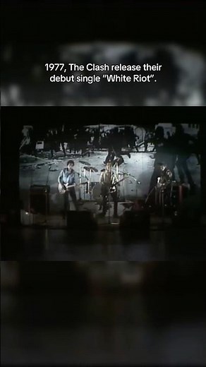 1977, The Clash release their debut single “White Riot”.