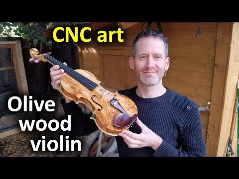 CNC carving a violin out of olive wood with the Shapeoko XXL