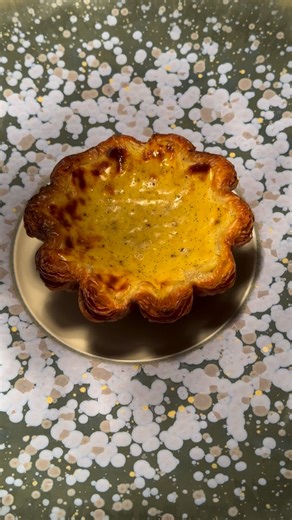 The Macanese Egg Tart, a croissant dough pastry case with rich egg vanilla flavoured custard. This week’s chef’s breakfast special. Available 10 until 16 November. #pavyllonlondon #londonfood #michelindining | Pavyllon London