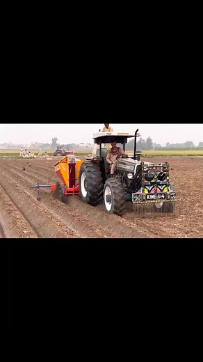 Massey Ferguson 385 Tractor Plowing a Field