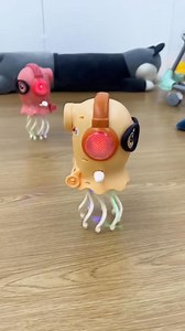 🌊 The Onshine Magical Electric Dancing Jellyfish Toy is ready to dance its way into your heart. Magical Movements: 🎶 This adorable jellyfish dances, wiggles, and lights up with dynamic music, creating an engaging show for kids and adults alike. Smart & Interactive: 🤖 Equipped with a sensor, it automatically avoids obstacles as it moves, making playtime seamless and fun. The Perfect Gift: 🎁 With its playful personality and vibrant design, this toy is an ideal gift for birthdays or any special