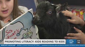 Kids read to goats in literacy program