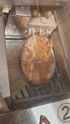 Warning: This bread slicing machine is more suspenseful than many horror movie scenes!