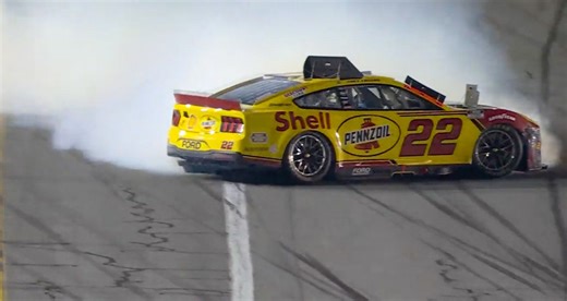 Joey Logano spins from the lead off Turn 4 late