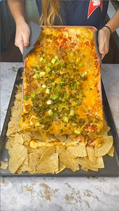 I learned this nacho trick at a Mexican restaurant Katie makes nachos in a super fun way. She makes the cheese on a separate pan, and then pours it over the chips. | The Madison Family