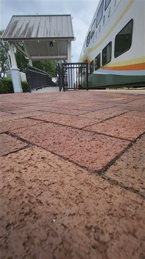 sunrail train stoping at winter park station.