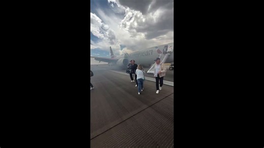 Landing gear fire prompts emergency evacuation at airport in Denver, Colorado