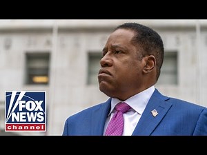 Woman in gorilla mask throws eggs at Larry Elder