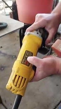 DeWalt angle grinder disc change.