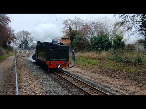 BVR - No.7 'Spitfire' crosses Spratts Green level crossing light engine.