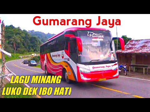 Minang sad song ubek ibo hati with Sumbar Gumarang jaya bus crossing Singkarak #laguminang