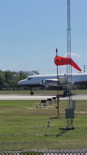 propeller cargo plane arriving at grand Cayman
