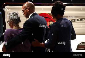 April 9, 2017 - St. Louis, MO, USA - Chuck Berry's wife Themetta ''Toddy'' Suggs, left, his son Charles Berry Jr. and his wife, pay respect to the rock 'n' roll legend, whose body lies in repose with his Gibson ES-335 guitar, during his memorial service on Sunday, April 9, 2017, at The Pageant in the Loop in St. Louis, Mo. (Credit Image: © Laurie Skrivan/TNS via ZUMA Wire Stock Photo - Alamy