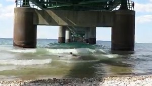 Waves rolling in under the south end of the Mighty Mac in August 2021. | MightyMac.org - The Mackinac Bridge & Straits of Mackinac