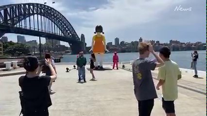 2.1M views · 49K reactions | A giant replica of the creepy “red light, green light” doll from Squid Game has popped up in Sydney. Here's hoping it won't be gunning down players...  https://bit.ly/3nHa4Pc | Daily Telegraph | Facebook