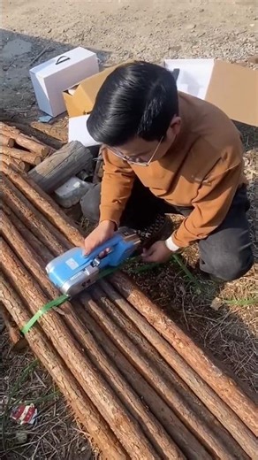 Strapping logs with this tool 🪵