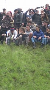 Cheese Rolling 😂 A nine pound round of Double Gloucester cheese is rolled from the very top of the hill and competitors chase after it down to the bottom. The first person across the finish line is crowned winner, with the cheese as their prize. 😍 | Mr Lowe
