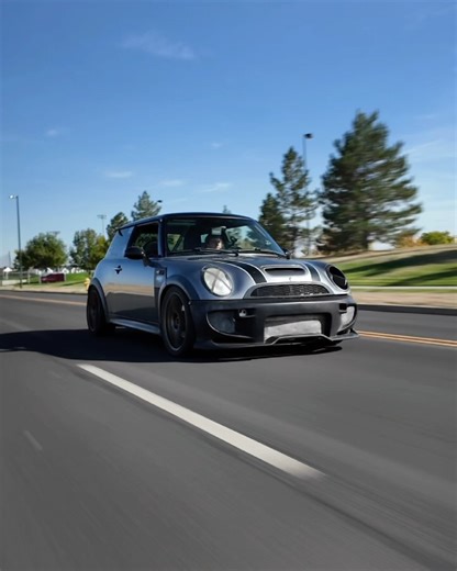 HYPEWHIP on Instagram: "SWIPE! ⬅️ This 2002 MINI Cooper S R53 is a high-performance compact car featuring several performance and aesthetic modifications. Powered by a 1.6L inline-4 supercharged engine, this particular model has been enhanced with a 17% reduced supercharger pulley, which increases boost and horsepower. The car boasts upgraded cooling systems, a custom intake, and a catless exhaust for improved performance. Handling improvements include lowering springs and a rollcage, while the 