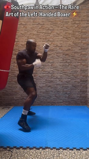 SHADOW BOXING: In this video, I highlight one of boxing’s rare gems: the Southpaw stance . Unpredictable, stylish, and deadly when mastered. Here’s a short shadowboxing session with clean, sharp combos 🎯. Watch, learn, and master the method. 👊🏾🔥 #Boxing #Southpaw #ShadowBoxing #BoxingSkills #LeftHandedBoxer #BoxingCombos #BoxingTechnique #BoxingMotivation #Discipline #WatchLearnAndMasterTheMethod | Junior Wabaga
