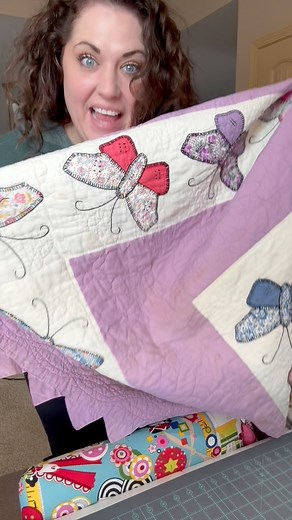 I received this old, stained quilt from my friend Jenn and knew immediately that it wanted to be a duffle bag. I am so excited with how this turned out! What do you think?Pattern: Patchwork Duffle by Knot Thread #sewingdiy #upcycledquilt #cutterquilt #quiltingproject #sewingproject #learntosew #upcycle | She Sews Seams