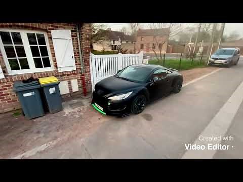 Peugeot RCZ tuning. Satin black with neon green