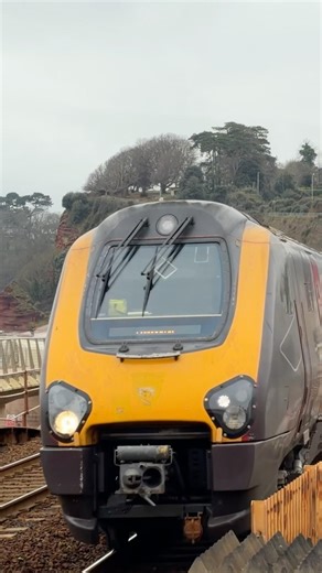 Cross country class 221 speeds down the seawall Dawlish-Plymouth to Edinburgh service 221132 voyager
