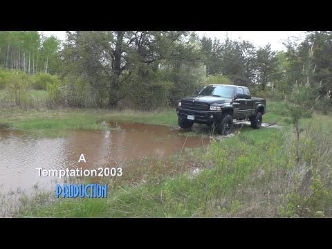 5" Lifted Dodge Ram on 35's throwing some mud!