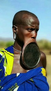 Mursi tribe women with large lip plate Omo Valley Ethiopia. . . 📽️ Mamaru Ethiopian Tours . . . #Ethiopia #OmoValley #omoriver #omoadvisor #tribe #tribes #mamaruethiopiantours #mamaru #mursi #mursitribe #mursitribes #omovalleytribes #omovalleytour #africantribes #travelafrica #travelethiopia #culturetraveler | Omo Advisor