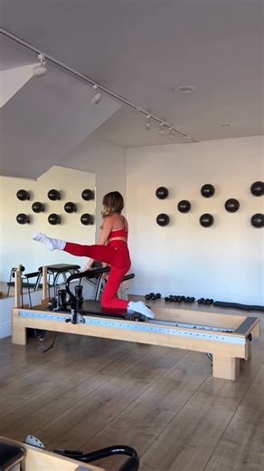 Pilates Body Laguna on Instagram: "Thread a needle over the infinity Extra light spring (yellow) ⚠️Harder than it looks! Challenging my good friends! @pilatesbody_ut & @core.clovis to try it🔥💪🏻 #pilates #pilateschallenge #infinitybar #balancebody #reformer #vuori"