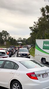 🚙 Hundreds of roads are still affected by flooding across Queensland's south-east causing chaos for drivers, with drivers in Brisbane experiencing hours-long delays exacerbated by this morning's heavy rains. 📹: Tim Haikmoller took this video at Henry Rd, Griffin, this morning, saying he'd been stuck in traffic for three hours. Check for road closures here: https://qldtraffic.qld.gov.au/ If you're heading out on the roads please slow down, leave extra space between the car in front and put your