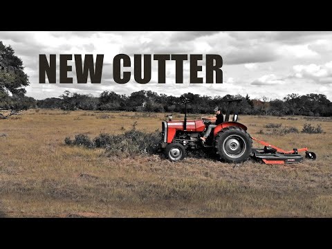 Clearing the land with a Massey Ferguson 231 and a new cutter