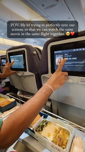 Prakriti Arora | Ashish ✈️ Travel Couple on Instagram: "60M+ 😱 How do you spend time on long flights?🍿✈️ We usually try booking overnight flights to catch up on sleep but day flights are for movies. A little bit of red wine, some bun n butter, you’ve got yourself a flight movie date. 🫶🏻❤️ Save this idea for your next long flight 💡✈️ #flighthacks #traveltips #coupletravel #longflights"
