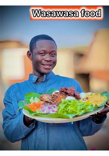 Delicious Black Jollof Rice and Cheesy Fish Recipe