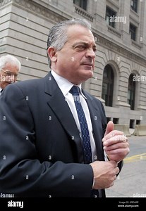 Joseph A. Bevilacqua, Jr., leaves federal court after pleading guilty to one felony count each of perjury and criminal contempt in U.S. District Court, Friday, May 20, 2005 in Providence, R.I. Bevilacqua, a defense attorney, admitted giving television reporter Jim Taricani, not pictured, an FBI surveillance video from the Operation Plunder Dome, then lying about it to a special prosecutor. Bevilacqua was also disbarred. (AP Photo/Stew Milne Stock Photo - Alamy