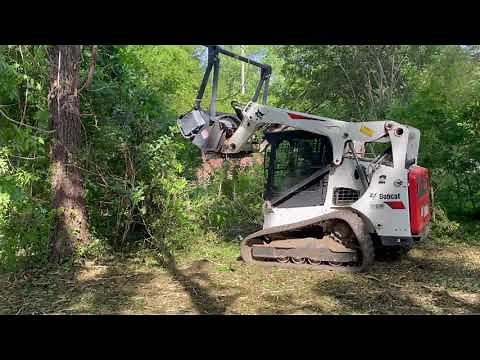 Low flow mulching head on a Bobcat T650