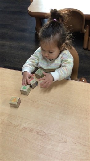 Stack em up! We enjoy seeing our littles play and learn here at Cornerstone 🥰 #LearnPlayGrowCornerstone #AugustaGA #LearnThroughPlay #BabyMilestones #PlayBasedLearning | Cornerstone Early Learning Center