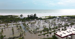 Hurricane Flooded Beach Parking Lot in Siesta Key Tourist Community in Sarasota, Florida, USA. Aftermath of Natural Stock Footage - Video of damage, surf: 372219540