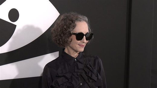 Bebe Neuwirth in flowing black dress while attending 'Cabaret'