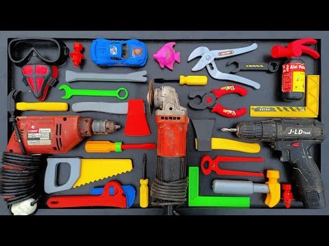 Collection of Repair Tools, Electric Drill, Electric Saw, Hammer With Wriench, Pliers, Hacksaw