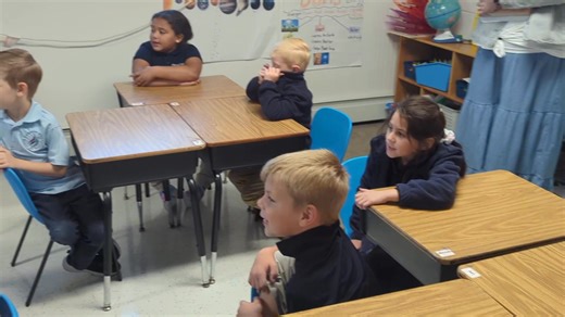 Mr. David Robinson (who wrote are Grammar School song) singing with the 1st and 2nd graders. | Spring Vale Christian School