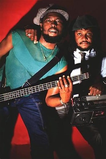 Sly and Robbie were a prolific Jamaican rhythm section and production duo, associated primarily with the reggae and dub genres. Drummer Sly Dunbar and bassist Robbie Shakespeare teamed up in the mid-1970s after establishing themselves separately in Jamaica as professional musicians. They recorded several albums under the Sly and Robbie name, and made hundreds of appearances on records by other performers. Shakespeare died in December 2021 following kidney surgery. 1970s: Beginnings in reggae Sly