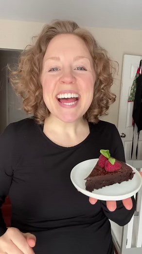 My flourless chocolate cake recipe is officially out! It’s perfectly crafted for those who crave an intense chocolate experience. Skip the flour, embrace the simplicity, and let your taste buds revel in the pure pleasure of this chocolatey masterpiece! #blogger #food #foodblogger #dessert #michiganblogger #bakery #bakinggoals #ohmyyum #recipes #recipe #recipedeveloper #easyrecipe #flourlesscake #flourlesschocolatecake #glutenfree #gf #chocolate #cake | The First Year