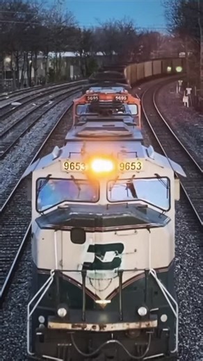 @deep_fried_archives on Instagram: "Almost two years ago today: BNSF 9653, wearing a recently painted BN stencil at the time, leads a westbound empty coal line towards the bridge junction in Memphis, Tennessee. Once a common sight, this would probably be the last time I’d ever see an executive leading a coal line. I would assume whoever pulled off the stencil knew this unit would be leading for one of the last times. This wouldn’t be the only instance where workers and/or rail fans modified patc